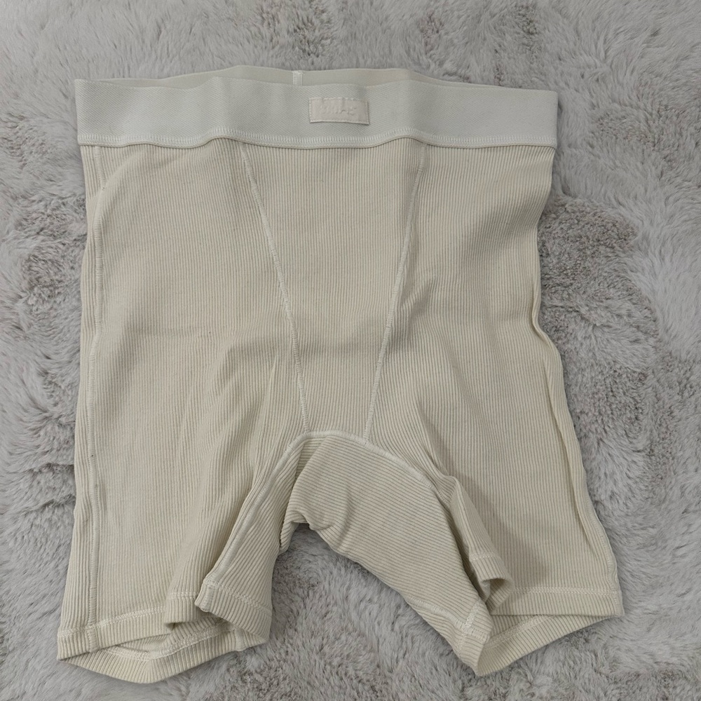 SKIMS cotton rib boxer short in color “bone”